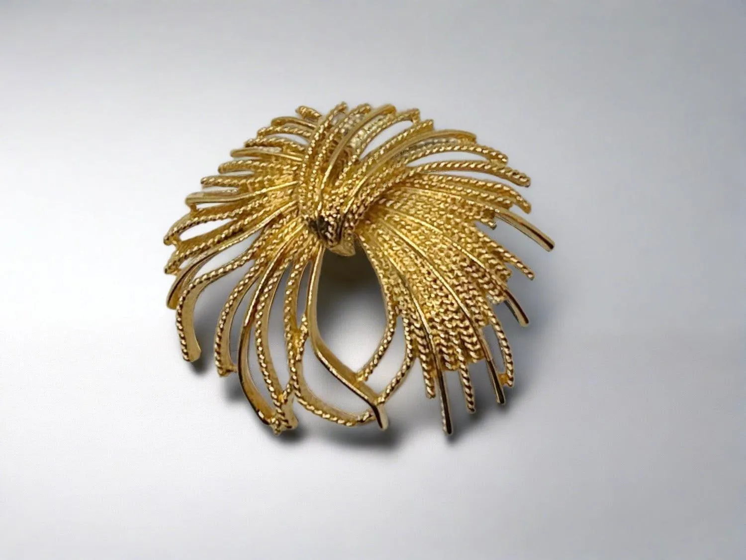 Monet  Vintage Gold Textured Tassel Pin