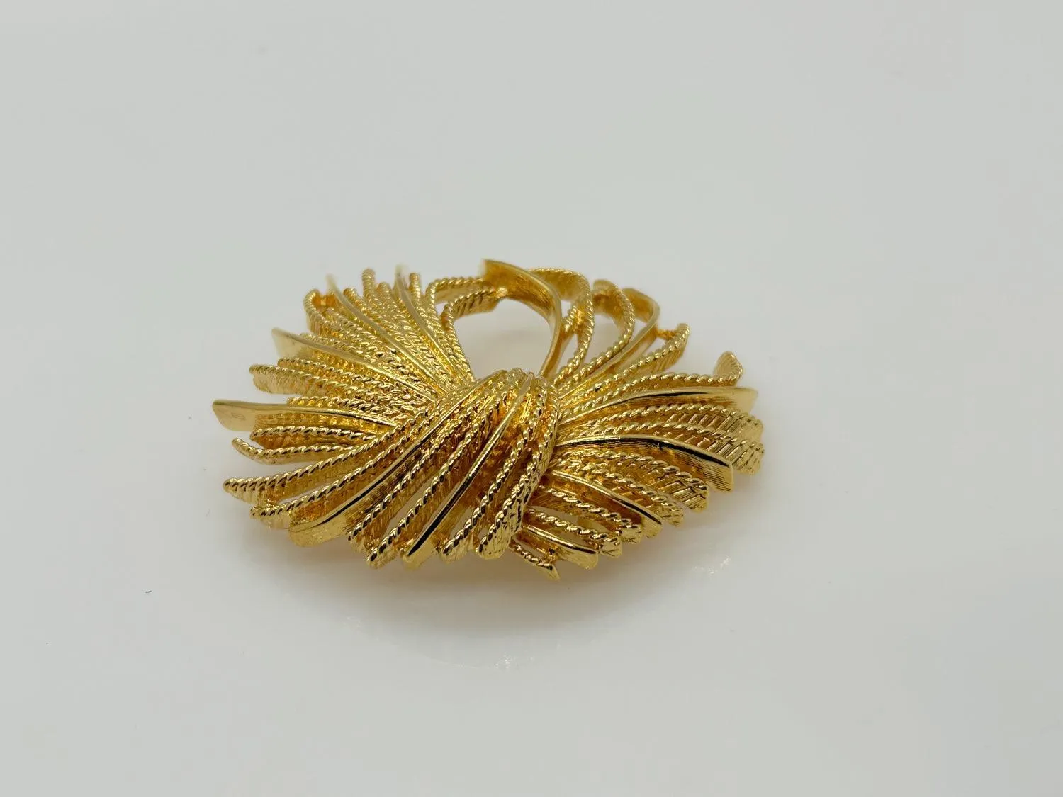 Monet  Vintage Gold Textured Tassel Pin